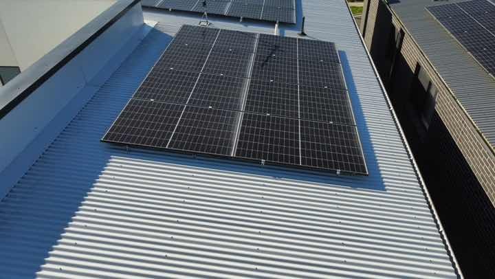 Roof cladding unevenness and flashing lift — immediate re-fixing advised to prevent ceiling leaks.